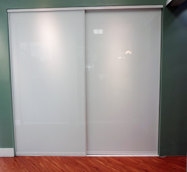 double bypass sliding white glass doors with white trim