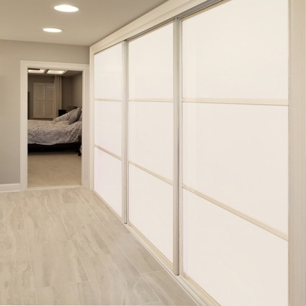 three section grid design white painted glass bypass sliding closet doors fully closed